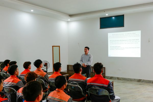Tan Long staff attending a workplace safety training session.