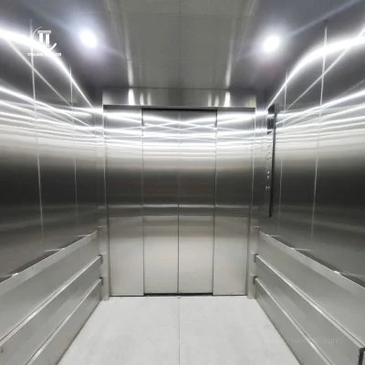 Metal ceiling and lights inside a Tan Long freight lift cabin at the Hanoi textile factory project